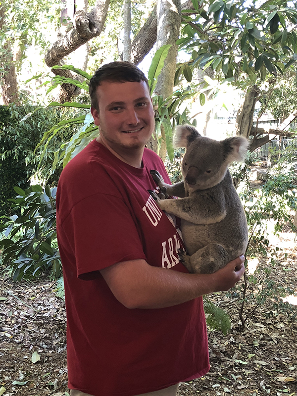 Paul Shanks holding a koala