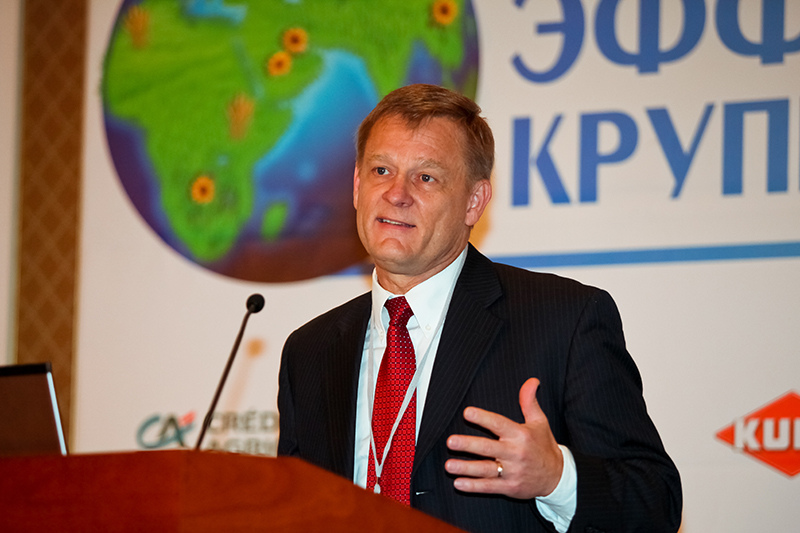 Bruce Ahrendsen speaking at a podium